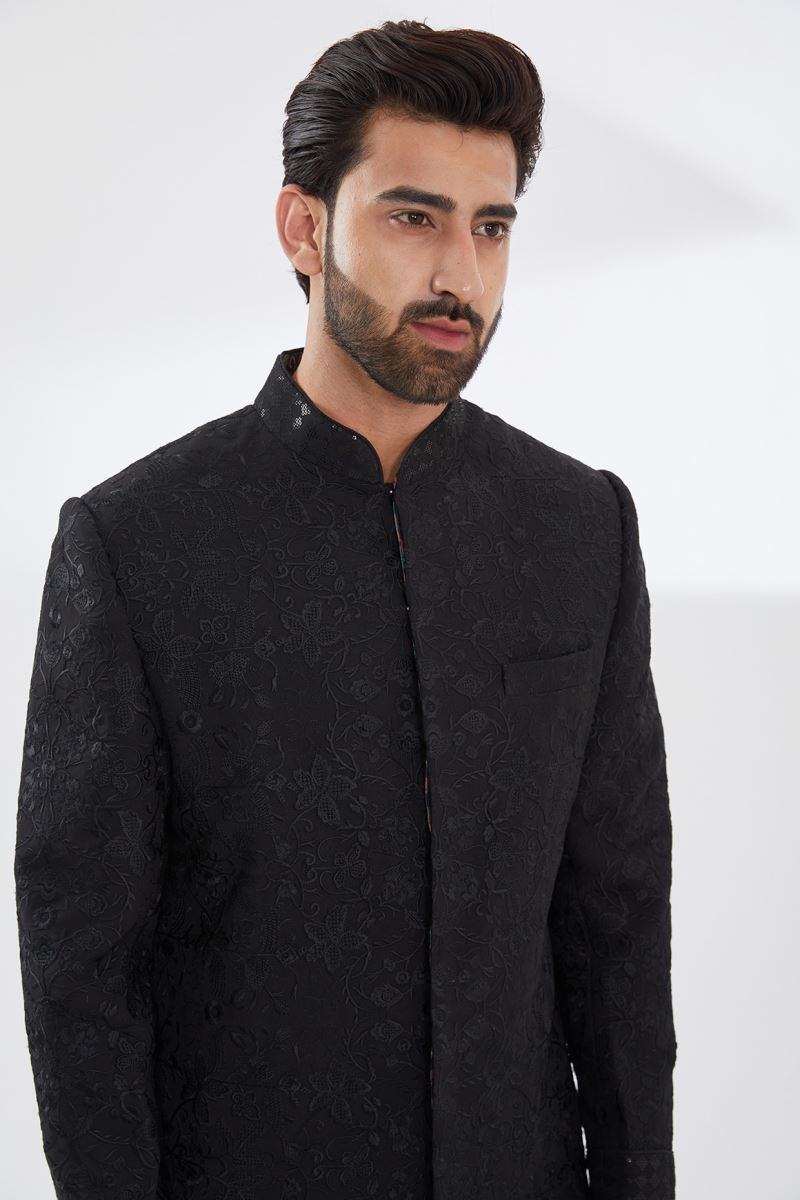 BLACK RESHAM JAAL SHERWANI SET WITH RED PRINT LINING, SEQUINS GRID CUFF AND COLLAR