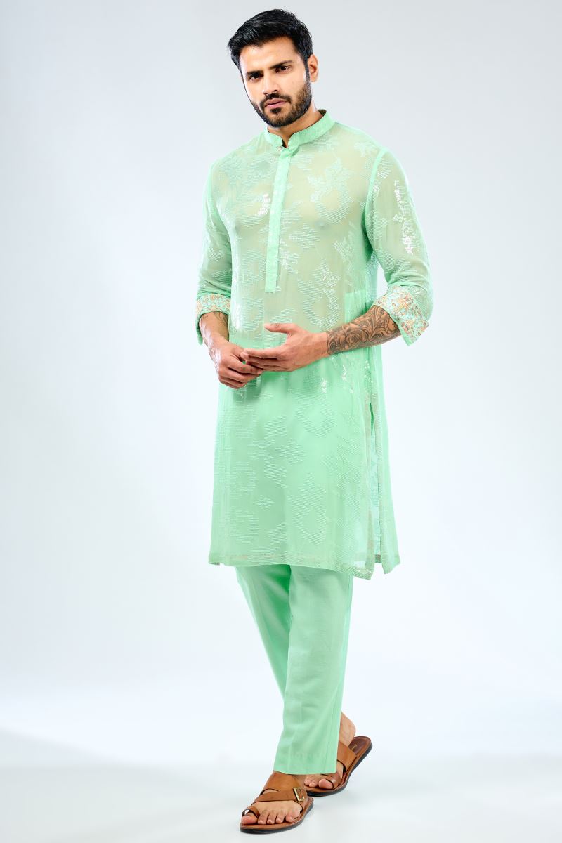 AQUA GEORGETTE SEQUINS EMBROIDERED KURTA WITH PRINT DETAILING PAIRED WITH COTTON SILK PANTS