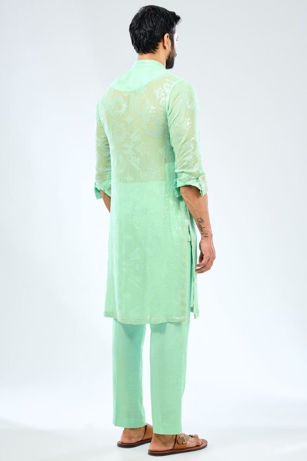 AQUA GEORGETTE SEQUINS EMBROIDERED KURTA WITH PRINT DETAILING PAIRED WITH COTTON SILK PANTS