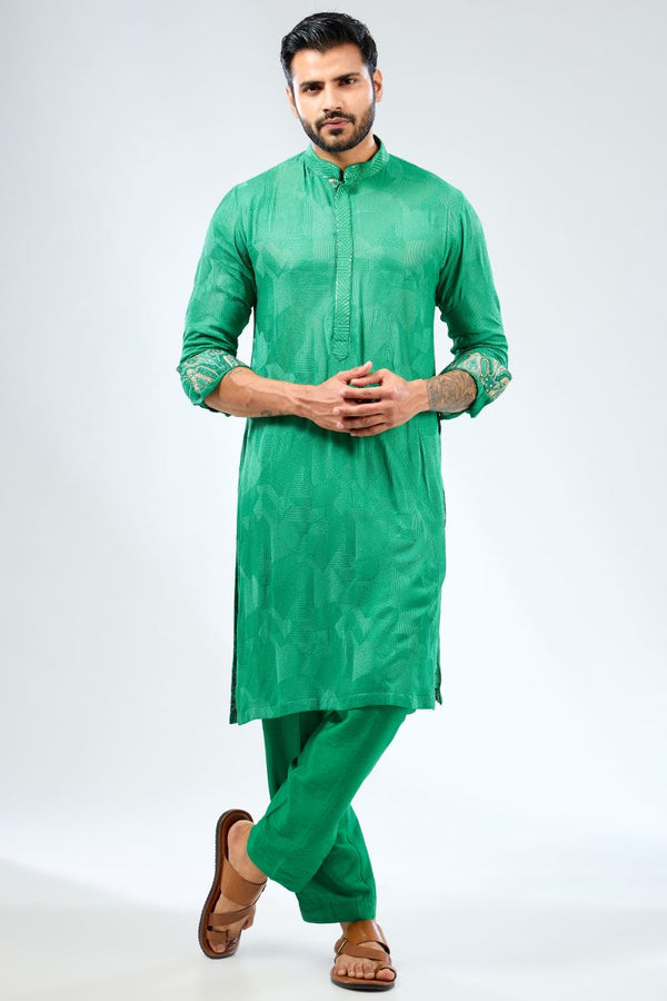 EMERALD GREEN GEORGETTE THREAD EMBROIDERED KURTA WITH PRINT DETAILING PAIRED WITH COTTON SILK PANTS