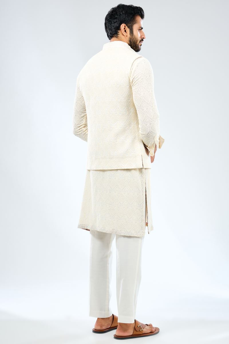 IVORY GEORGETTE THREAD EMBROIDERED PRINT DETAILING KURTA WITH BUNDI AND MATCHING COTTON SILK PANTS