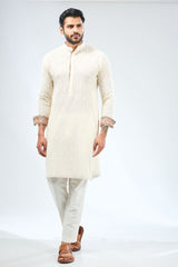 IVORY GEORGETTE THREAD EMBROIDERED PRINT DETAILING KURTA WITH BUNDI AND MATCHING COTTON SILK PANTS