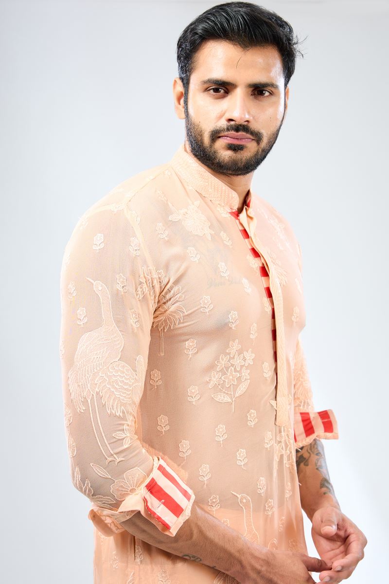 PALE PEACH GEORGETTE THREAD EMBROIDERED PRINT DETAILING KURTA WITH BUNDI AND COTTON SILK PANTS