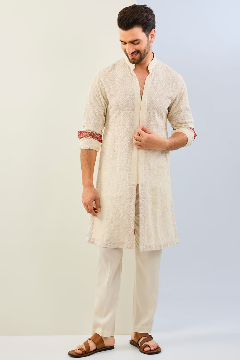 IVORY GORGETTE THREAD EMBOIDERED  UNLIED KURTA WITH PRINT DETAILING AND MATCHING COTTON SILK PANT