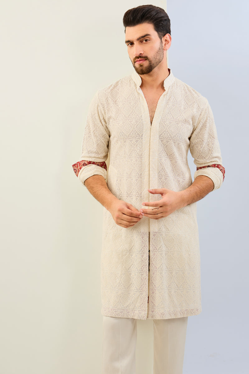 IVORY GORGETTE THREAD EMBOIDERED  UNLIED KURTA WITH PRINT DETAILING AND MATCHING COTTON SILK PANT