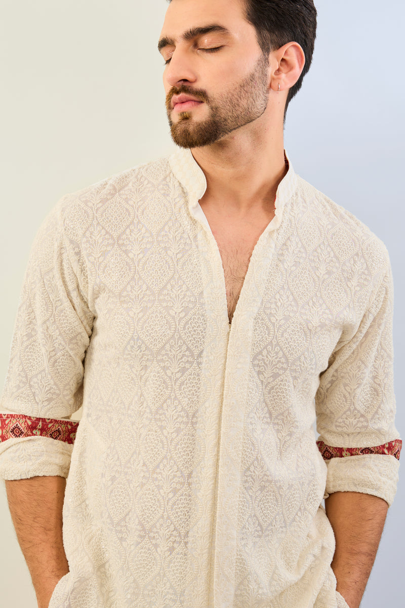 IVORY GORGETTE THREAD EMBOIDERED  UNLIED KURTA WITH PRINT DETAILING AND MATCHING COTTON SILK PANT