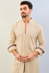 CREAM GORGETTE THREAD LEAF EMBOIDERED UNLIED KURTA WITH PRINT DETAILING AND MATCHING COTTON SILK PANT