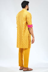 YELLOW ZARI  BOOTI AND SEQUIN BANDHANI KURTA WITH RANI  BANDHANI DETAILING AND COTTON SILK PANTS