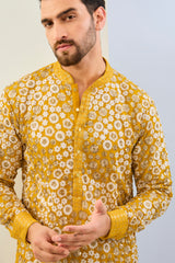 HALDI YELLOW GORGETTE WITH THREAD SEQUIN WORK LINED KURTA WITH SEQUIN CUFF, COLLAR, PLACKET  AND MATCHING COTTON SILK PANT