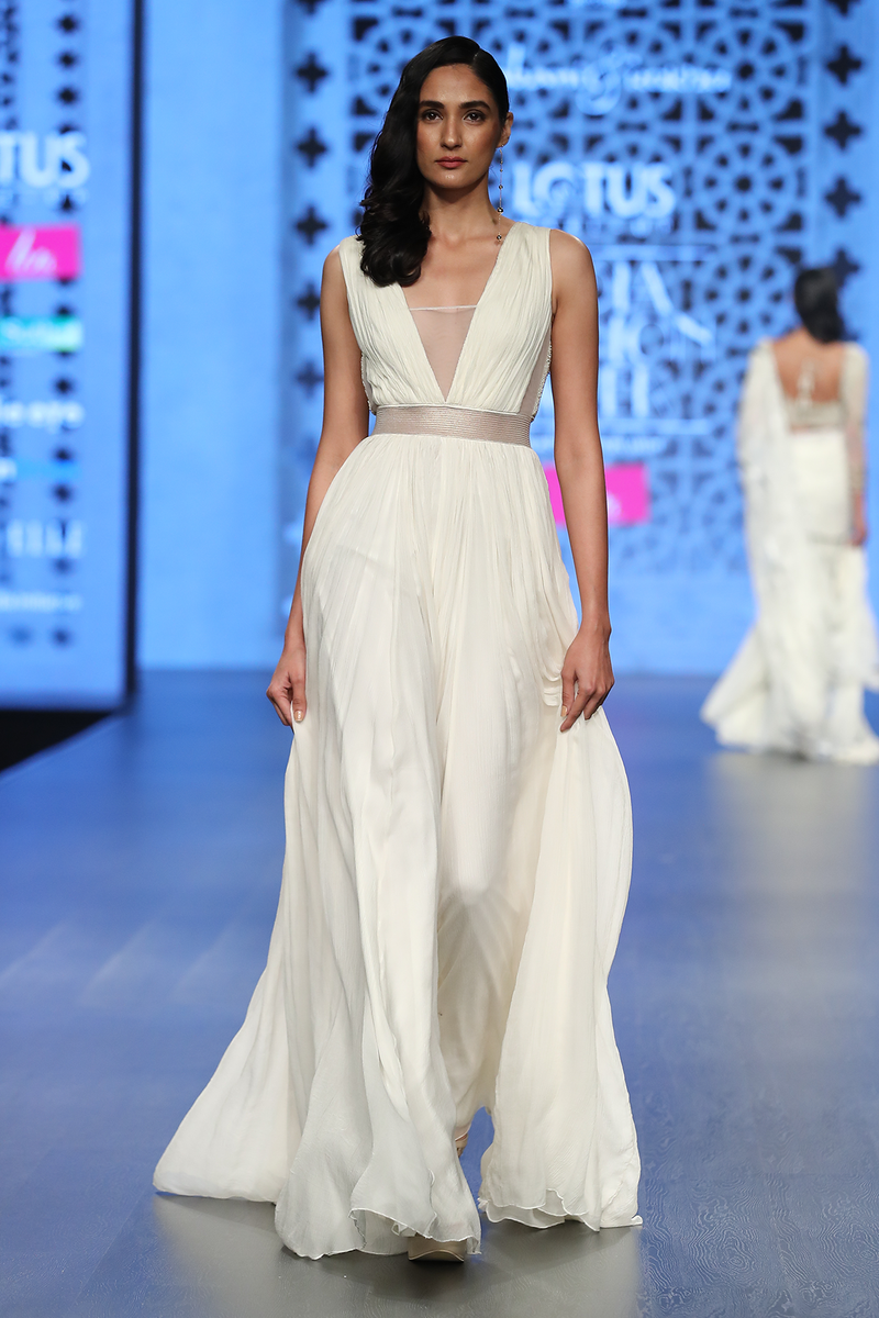 IVORY CHIFFON ROUGHED JUMPSUIT WITH GREEN TASSELS AT BACK
