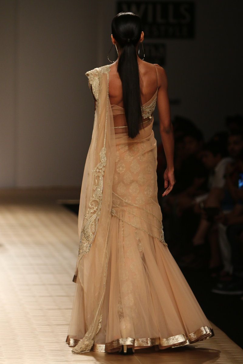 Sun Kissed Peach Net Frill Lehenga Sari with Paisley Border Drape with Booti Petticoat And Paisiley Bustier Blouse